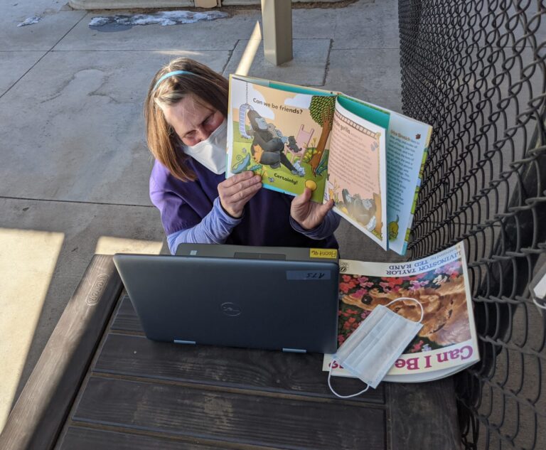 Teacher reading to class online